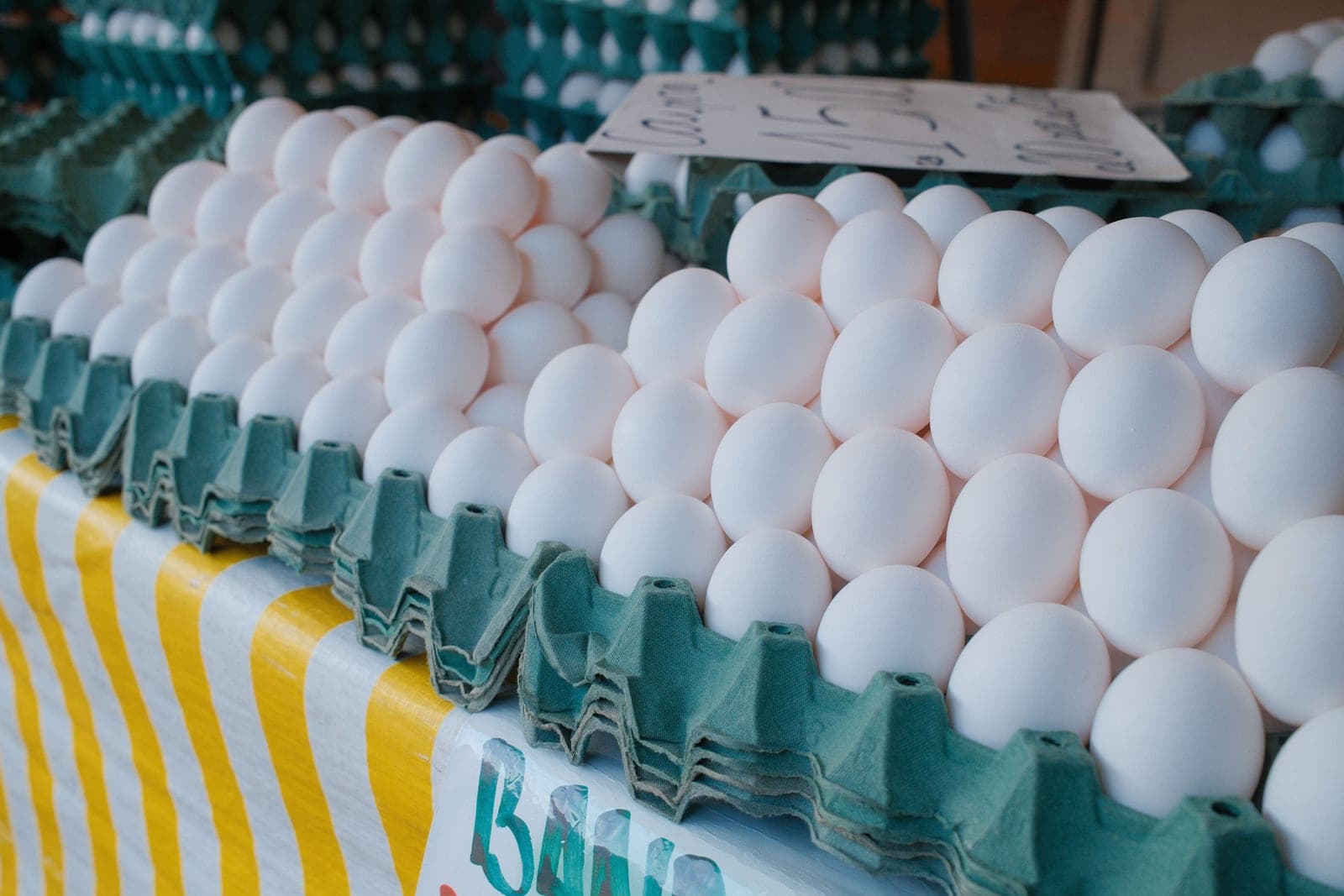 Brown eggs arranged in a cardboard egg carton